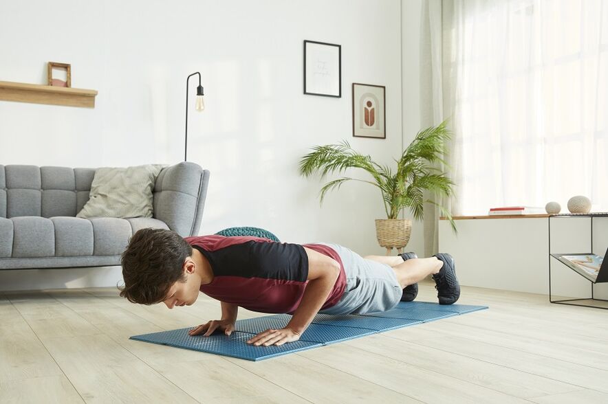Stand on the plank to work the muscles of the press and back